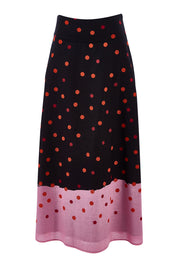 Product shot of the Rosie Maxi Skirt in colour Dots (Black), from the front