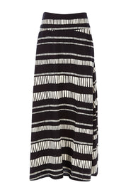Product shot of the Rosie Maxi Skirt in colour Sandstone (Black), from the front