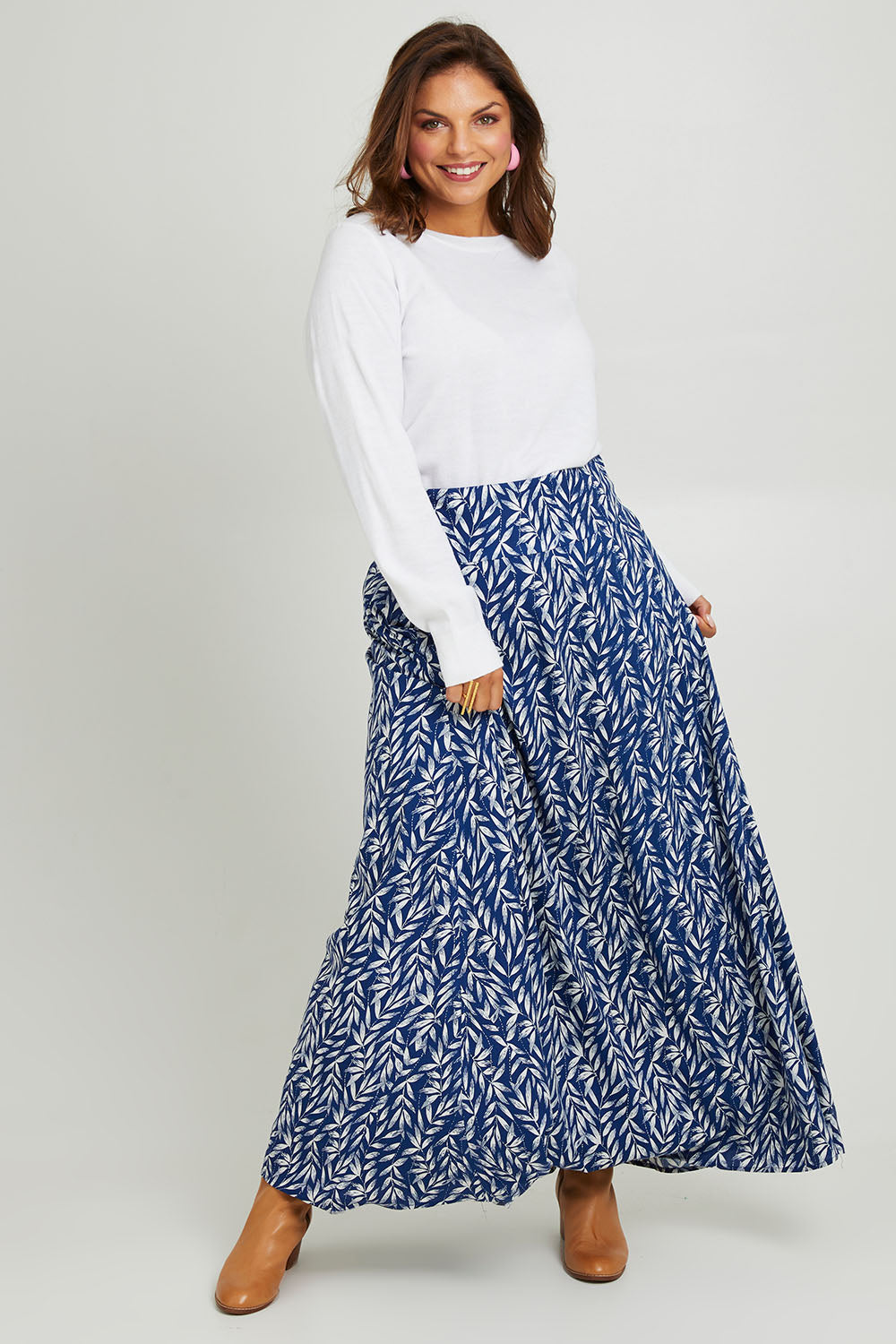 Model Monique wearing size 14 of the Rosie Maxi Skirt in colour Forest (Blue), from the front, showing the whole outfit