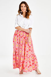 Model Laura wearing size 14 of the Mallory Tier Skirt in colour Pinkdaisy (Pink), from the front, showing the whole outfit