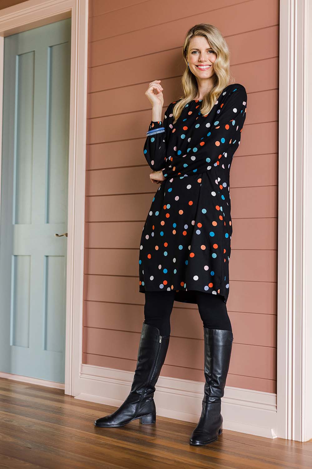 Model Kelly wearing size 10 of the Katy Shift Dress in colour Dot (Black), from the front, showing the whole outfit