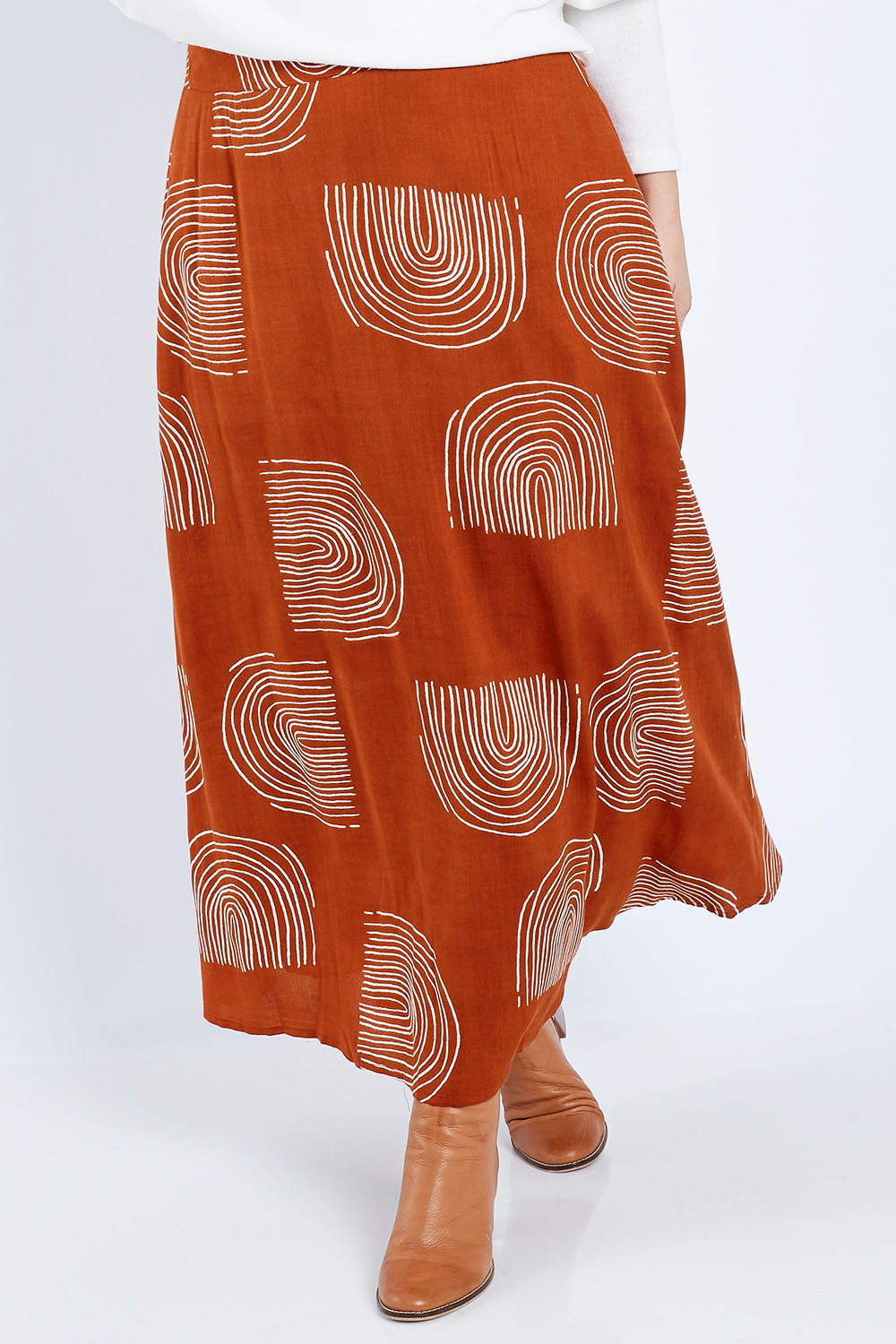 Model Jess wearing size 14 of the Rose Maxi Skirt in colour Rainbow, from the front, cropped image