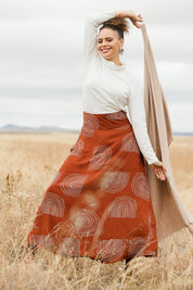 Model Lala wearing size 10 of the Rose Maxi Skirt in colour Rainbow, from the front, showing the whole outfit