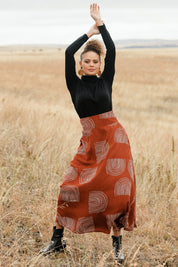 Model Lala wearing size 10 of the Rose Maxi Skirt in colour Rainbow, from the front, showing the whole outfit