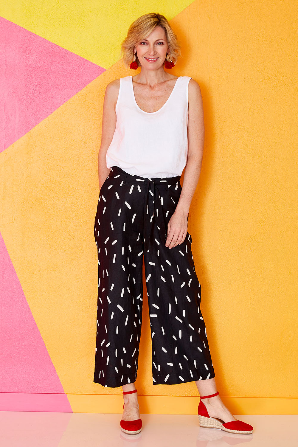 Model Veronica wearing size 10 of the Leianna 3/4 Pants in colour Sprinkles (Black), from the front, showing the whole outfit
