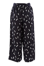 Product shot of the Leianna 3/4 Pants in colour Sprinkles (Black), from the back