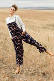Model Lala wearing size 10 of the Tilly Overalls in colour Raindrops (Blue), from the front, showing the whole outfit