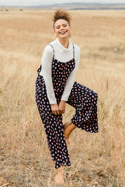 Model Lala wearing size 10 of the Tilly Overalls in colour Raindrops (Blue), from the front, showing the whole outfit