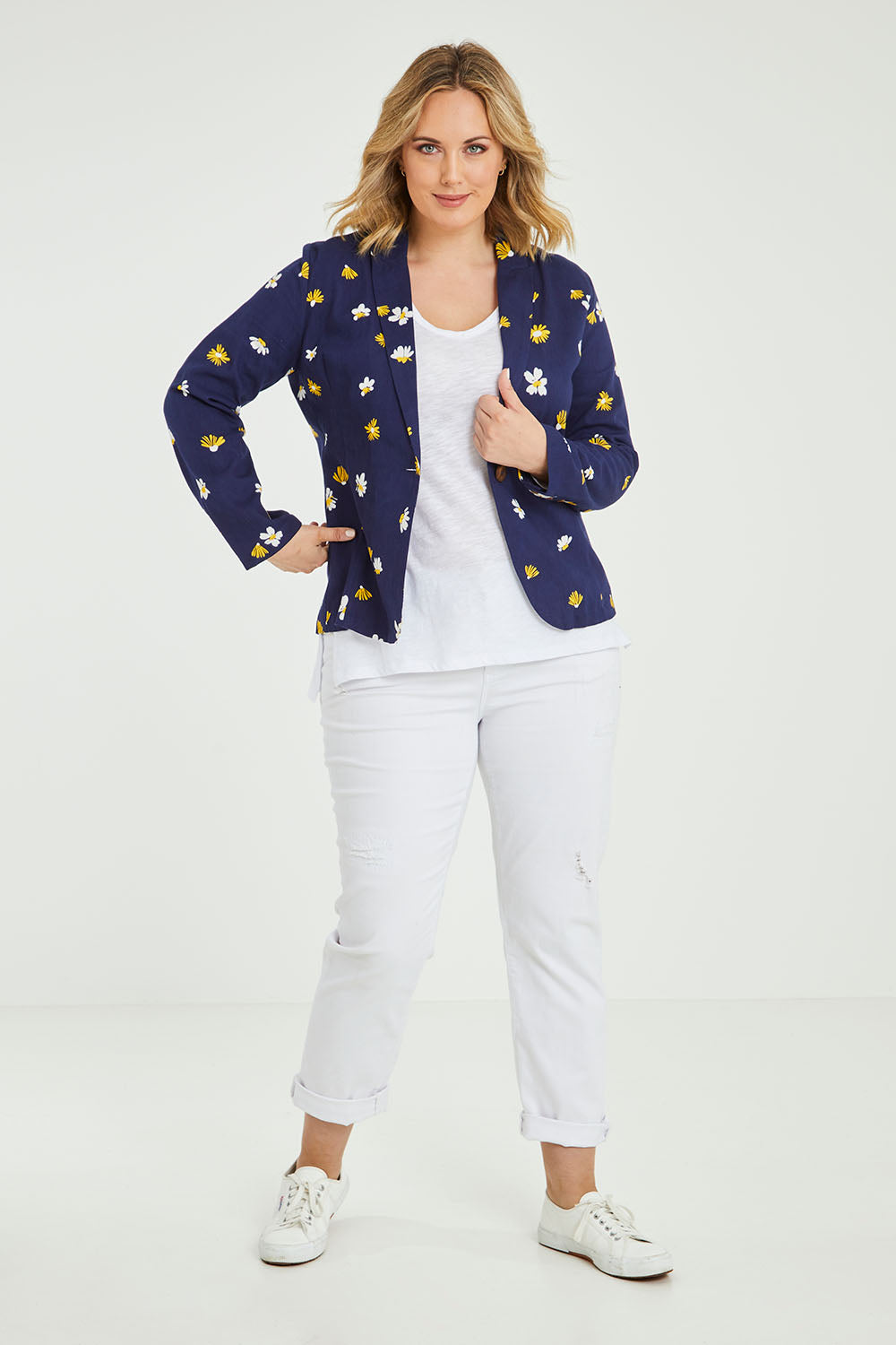 Model Jess wearing size 14 of the Sally Cotton Blazer in colour Daisy (Blue), from the front, showing the whole outfit