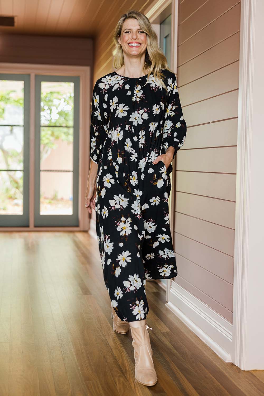 Model Kelly wearing size 10 of the Alice Gathered Dress in colour Magnolia (Black), from the front, showing the whole outfit