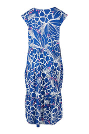 Product shot of the Madison Tiered Dress in colour Bloom (Blue), from the back