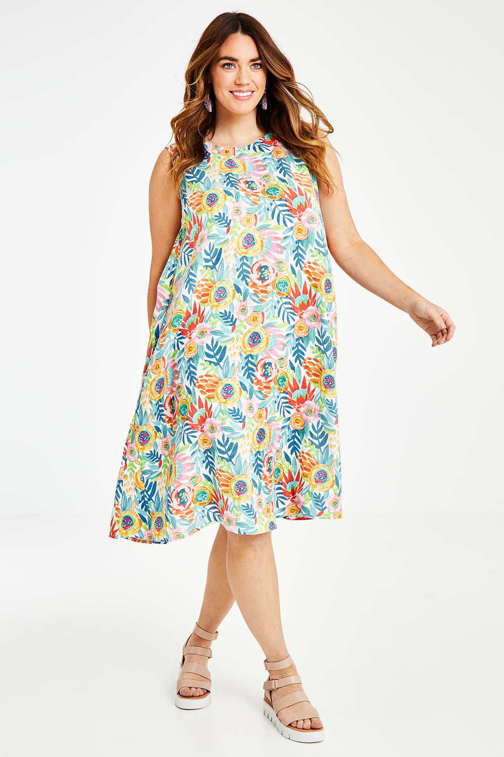 Model Laura wearing size 14 of the Zoey Shift Dress in colour Meadow (Blue), from the front, showing the whole outfit