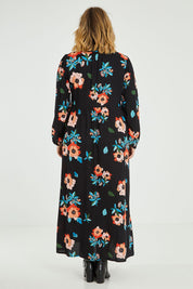 Model Jess wearing size 14 of the Jennifer Maxi Dress in colour Poppy (Red), from the back