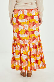Model Jess wearing size 14 of the Heather Maxi Skirt in colour Wallflower, from the back