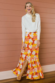 Model Kelly wearing size 10 of the Heather Maxi Skirt in colour Wallflower, from the front, showing the whole outfit