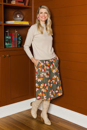 Model Kelly wearing size 10 of the Elisabeth Ain colourLine Cotton Skirt - Gerbera (Red), from the front, showing the whole outfit