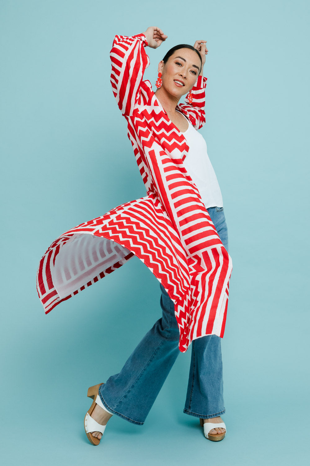 Model Katie wearing size 10 of the Abby Shirt Dress in colour Patchwork (Red), from the front, showing the whole outfit