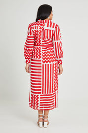 Model Terri-Leigh wearing size 14 of the Abby Shirt Dress in colour Patchwork (Red), from the back