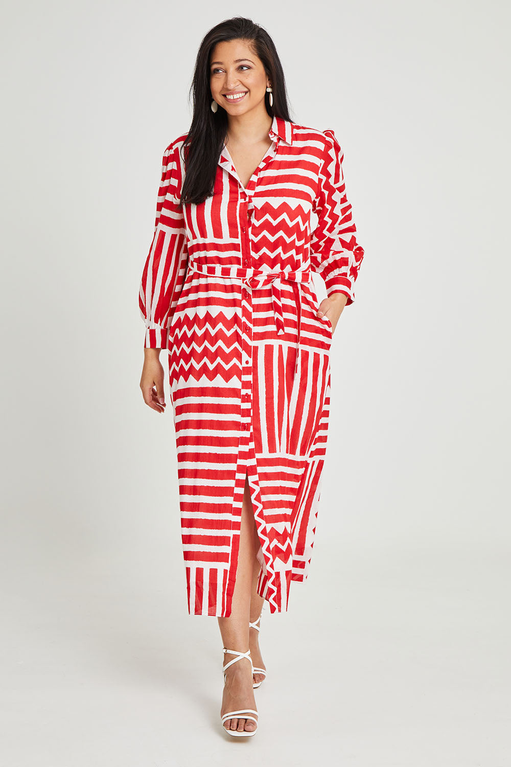 Model Terri-Leigh wearing size 14 of the Abby Shirt Dress in colour Patchwork (Red), from the front, showing the whole outfit