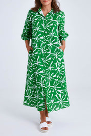 Model Monique wearing size 14 of the Abby Shirt Dress in colour Zinnia (Green), from the front, cropped image