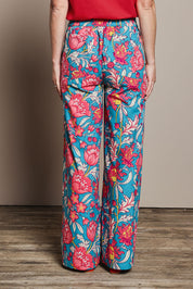 Model Katie wearing size 10 of the Stella Cotton Pant in colour Thistle, from the back