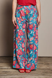 Model Katie wearing size 10 of the Stella Cotton Pant in colour Thistle, from the front, cropped image