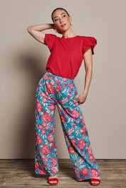 Model Katie wearing size 10 of the Stella Cotton Pant in colour Thistle, from the front, showing the whole outfit