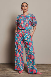 Model Katie wearing size 10 of the Stella Cotton Pant in colour Thistle, from the front, showing the whole outfit