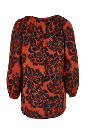 Product shot of the Jess Blouse in colour Blooming (Black), from the back