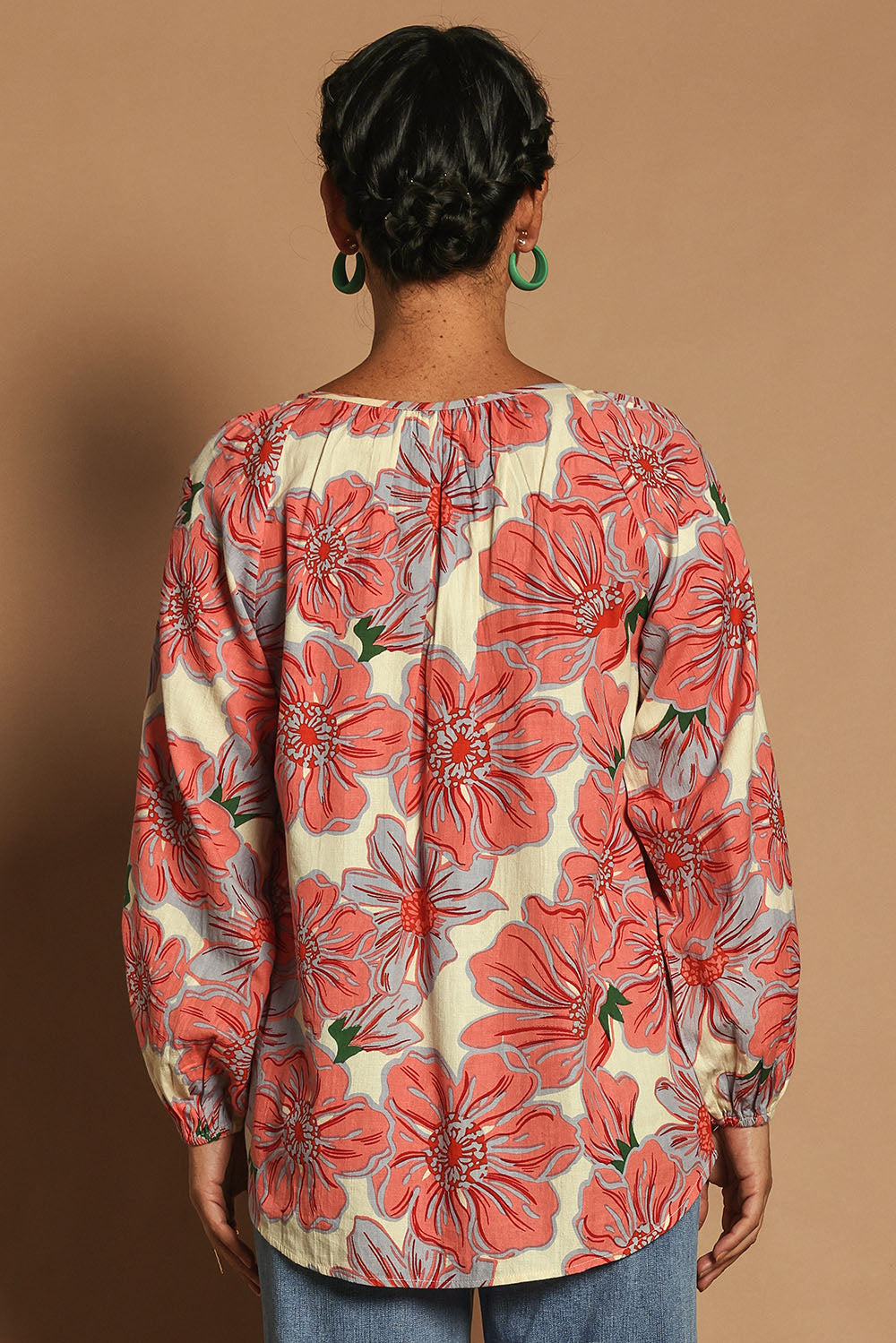 Model Katie wearing size 10 of the Jess Cotton Blouse in colour Rosettes, from the back