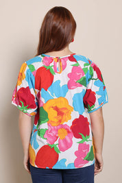Model Georgiel wearing size 10 of the Rachel Cotton Top – Botanix in colour Botanix, from the back