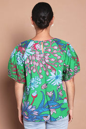 Model Katie wearing size 10 of the Rachel Cotton Top in colour Greengard (Green), from the back