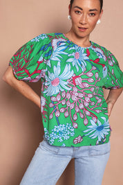 Model Katie wearing size 10 of the Rachel Cotton Top in colour Greengard (Green), from the front, cropped image