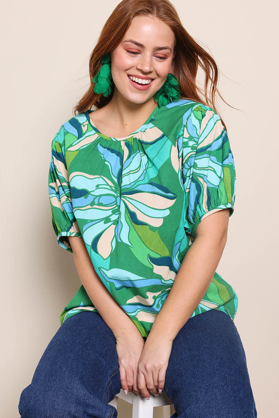 Model Georgiel wearing size 10 of the Rachel Cotton Top – Petalrush in colour Petalrush, in a cropped view