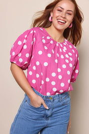 Model Georgiel wearing size 10 of the Rachel Cotton Top – Pinkspot in colour Pinkspot, in a cropped view