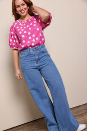 Model Georgiel wearing size 10 of the Rachel Cotton Top – Pinkspot in colour Pinkspot, from the front