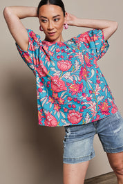 Model Katie wearing size 10 of the Rachel Cotton Top in colour Thistle, from the front, cropped image