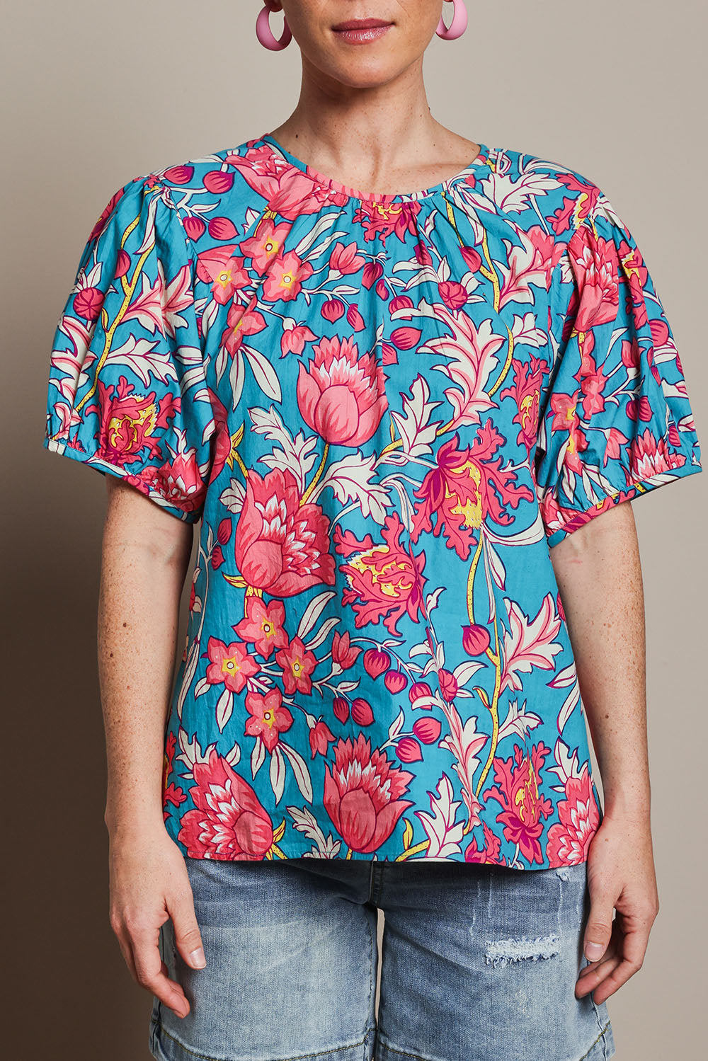 Model Katie wearing size 10 of the Rachel Cotton Top in colour Thistle, from the front, cropped image