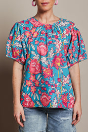 Model Katie wearing size 10 of the Rachel Cotton Top in colour Thistle, from the front, cropped image