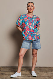 Model Katie wearing size 10 of the Rachel Cotton Top in colour Thistle, from the front, showing the whole outfit