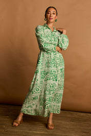 Model Katie wearing size 10 of the Lucy Shirt Dress in colour Labyrinth (Green), from the front, showing the whole outfit