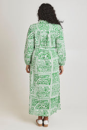 Model Terri-Leigh wearing size 14 of the Lucy Shirt Dress in colour Labyrinth (Green), from the back