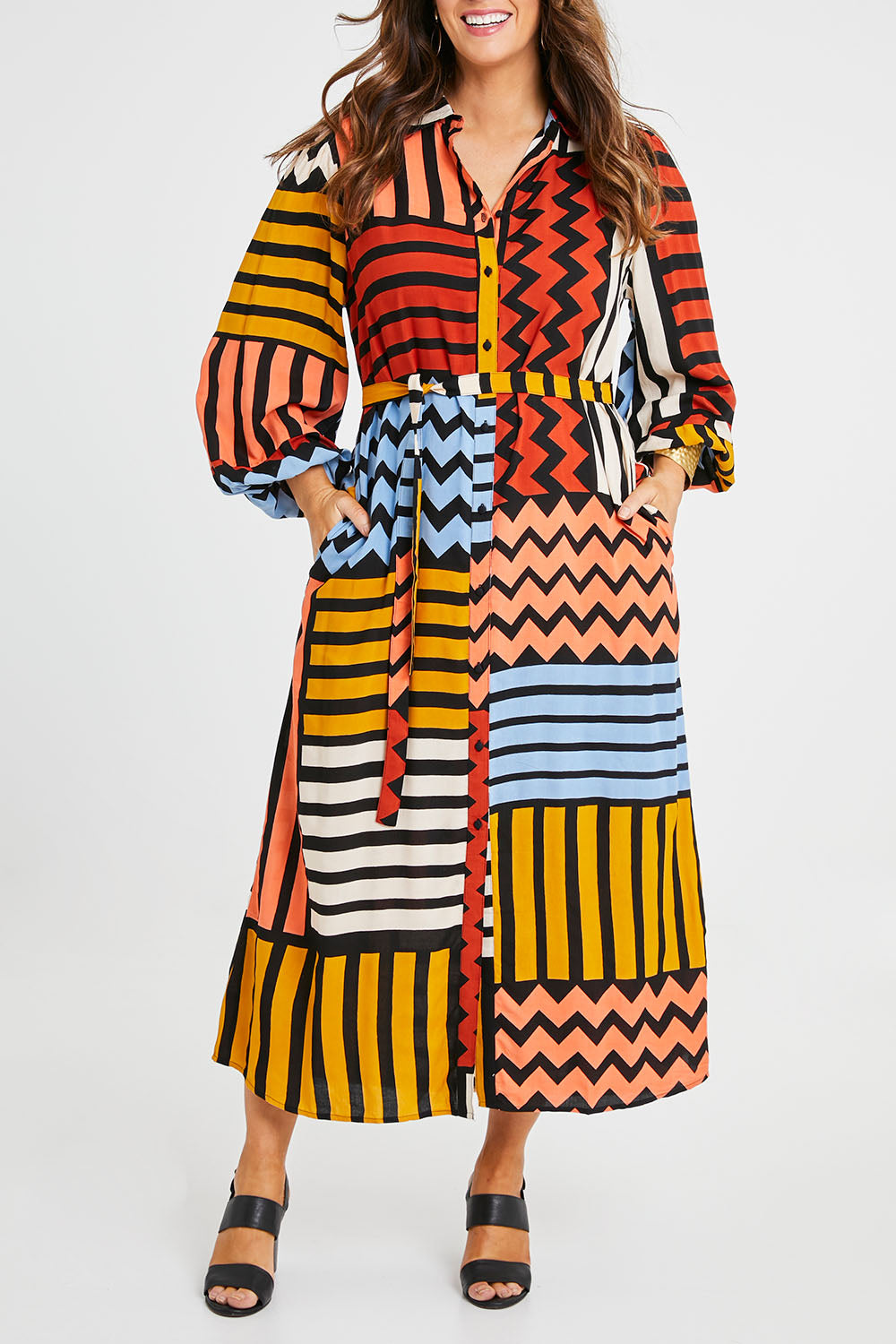 Model Laura wearing size 14 of the Lucy Shirt Dress in colour Lines (Black), from the front, cropped image
