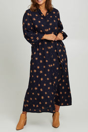 Model Monique wearing size 14 of the Lucy Shirt Dress in colour Nightsky (Blue), from the front, cropped image