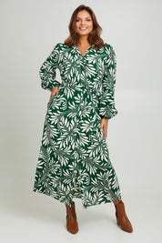 Model Monique wearing size 14 of the Lucy Shirt Dress in colour Swirl (Green), from the front, showing the whole outfit