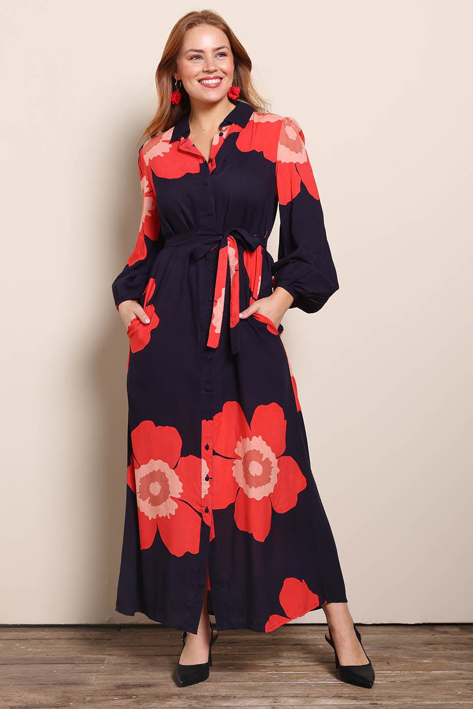 Model Georgiel wearing size 10 of the Lucy Maxi Shirt Dress – Boldflower in colour Boldflower, from the front