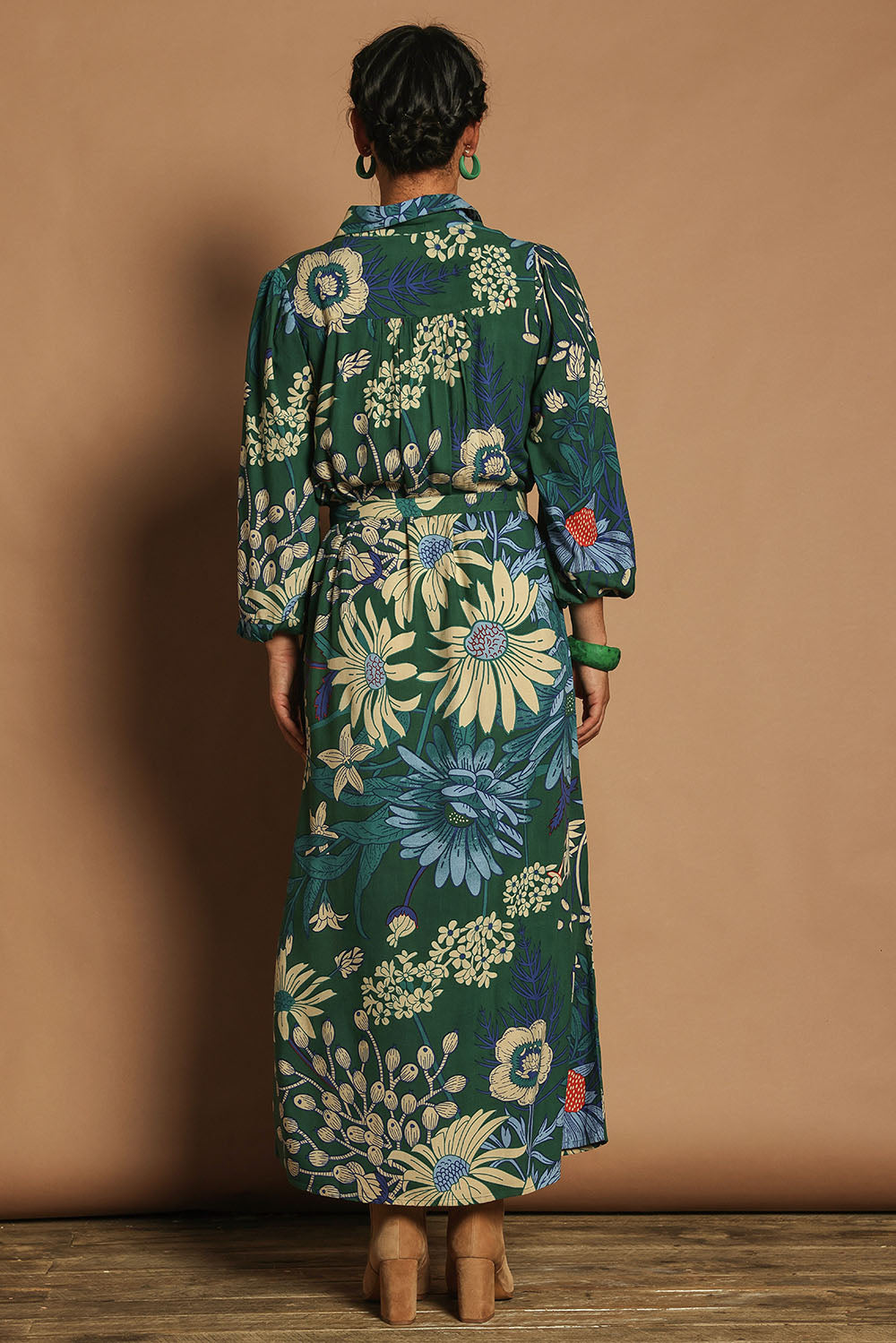 Model Katie wearing size 10 of the Lucy Maxi Shirt Dress in colour Darkgarden (Blue), from the back