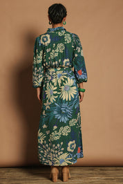 Model Katie wearing size 10 of the Lucy Maxi Shirt Dress in colour Darkgarden (Blue), from the back