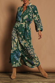 Model Katie wearing size 10 of the Lucy Maxi Shirt Dress in colour Darkgarden (Blue), from the front, cropped image
