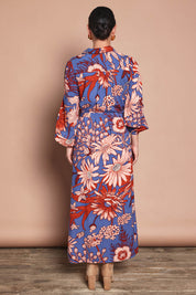 Model Katie wearing size 10 of the Lucy Maxi Shirt Dress in colour Gardenblue (Blue), from the back